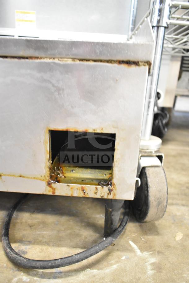 Countertop electric griddle, flat top, 208V, 1 phase, visible grease buildup, moderate wear, metal exterior.