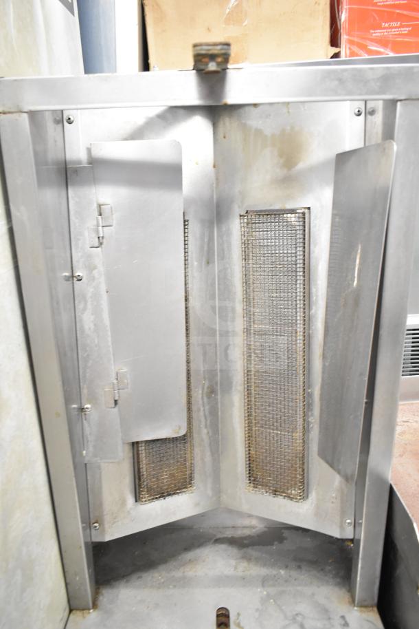 Autodoner 3PG countertop vertical broiler, natural gas powered, 30,000 BTU, stainless steel, used condition.
