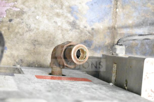 Autodoner 3PG countertop vertical broiler, natural gas-powered, 30,000 BTU, visible gas connection port, used condition.