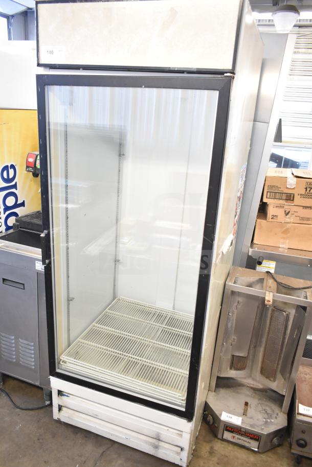 Beverage Air MT27 commercial single door cooler, used condition, 115 Volts, 1 Phase, glass front, shelving intact.