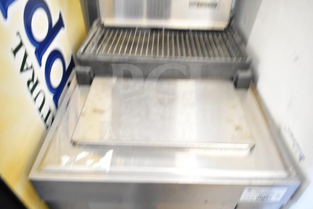 Commercial 6 Flavor Carbonated Beverage Machine on Servend DI-1522 Ice Bin, 115V, 1 Phase, stainless steel finish.