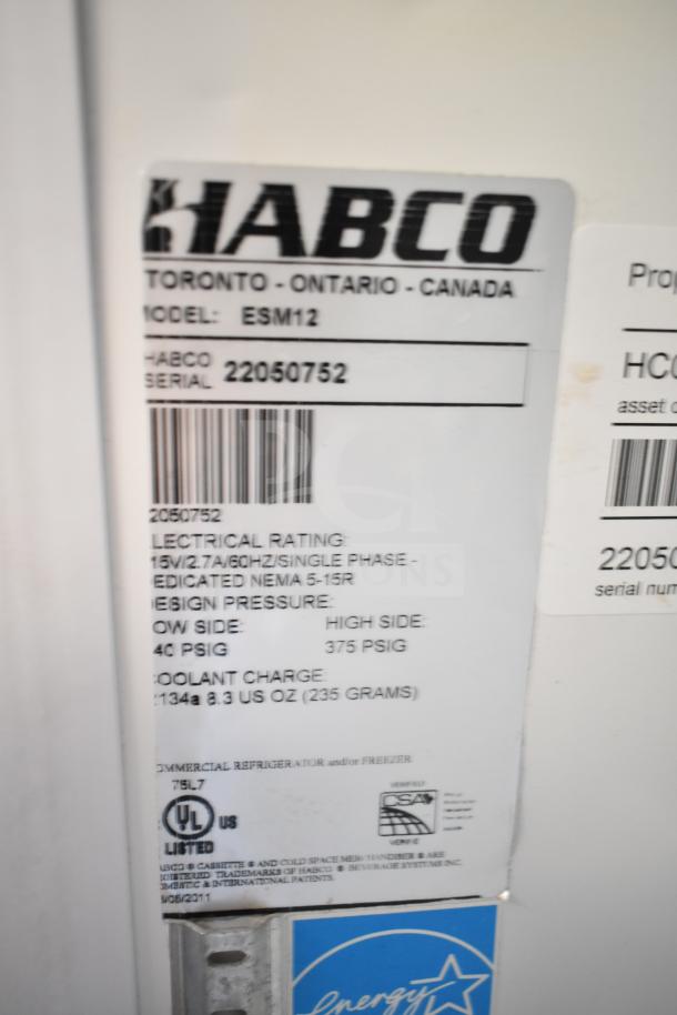 Habco ESM12 cooler label showing model, serial number 22050752, electrical rating 115V, 1 phase, and coolant charge details.