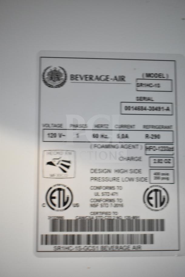 Beverage Air SR1HC-1S commercial cooler, single door, on casters, 120V, 1 phase, model tag details visible.