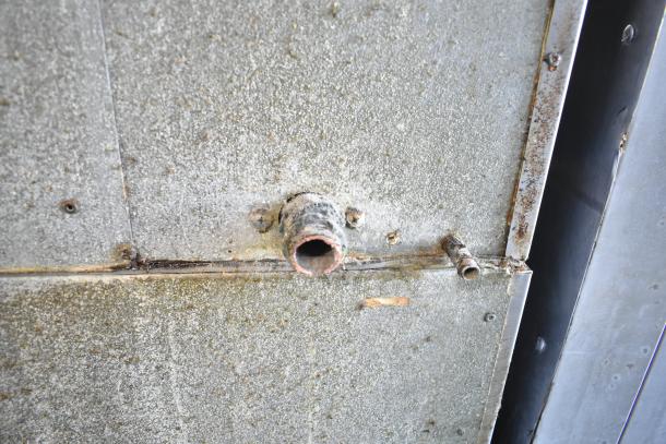 Hoshizaki KM-515MWH commercial ice machine and bin, 115-120 volts, 1 phase, showing exterior surface details and wear.