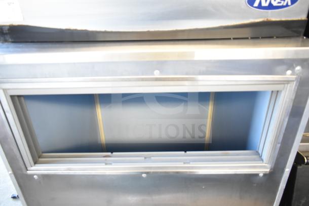 Atosa YR800-AP-261 commercial ice head on bin, 230 volts, stainless steel, visible interior, used condition.