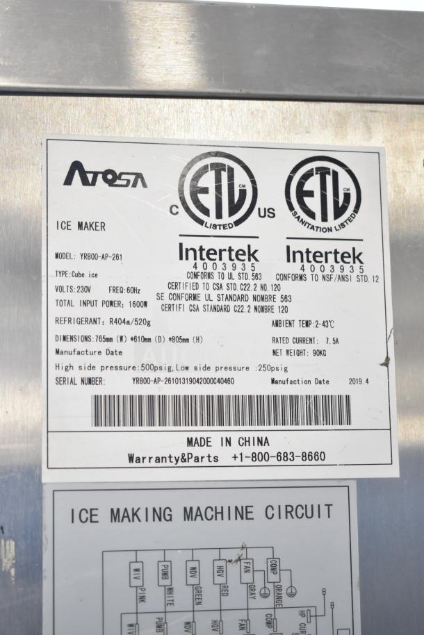 Atosa YR800-AP-261 commercial ice maker label showing model details, 230V, ETL listed, cube ice type, serial number, and specs.