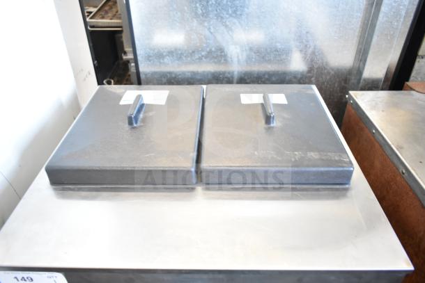 SaniServ W5273P commercial soft serve ice cream machine, two-flavor with twist, water-cooled, on casters, 208-230V, 3 phase.