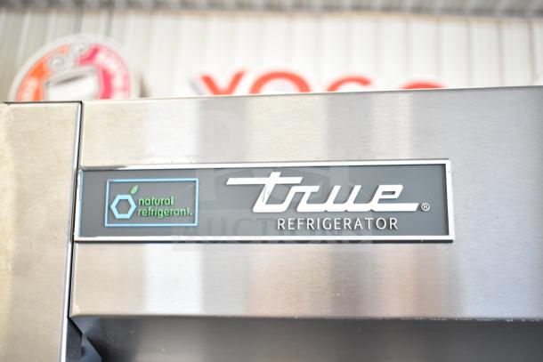 2019 True T-49G-HC 2-door reach-in cooler, natural refrigerant label, stainless exterior, 115V, 1 phase.