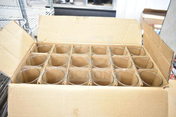 Box of assorted glassware, including Libbey highball and pilsner glasses, and Guinness and Stella Artois beer glasses. Mint condition.