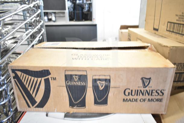 Cardboard box labeled with Guinness logo, showing glassware inside. Box is unopened, containing Libbey and Guinness glasses.