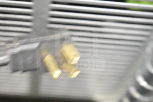 Blurred close-up of the Beverage Air WTR48AHC 2 Door Undercounter Cooler plug and vent area.