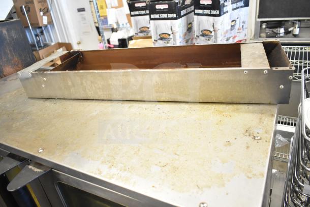 2 Seagate full-size convection ovens with view-through doors and thermostatic controls on commercial casters. Visible wear.