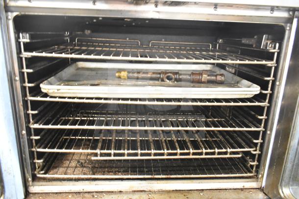 2 Seagate commercial full-size convection ovens with view-through doors, thermostatic controls, on casters, used condition.