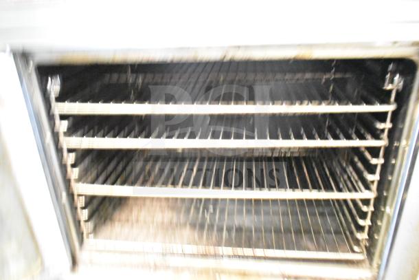 2 Seagate full-size convection ovens on casters, with view-through doors and thermostatic controls.