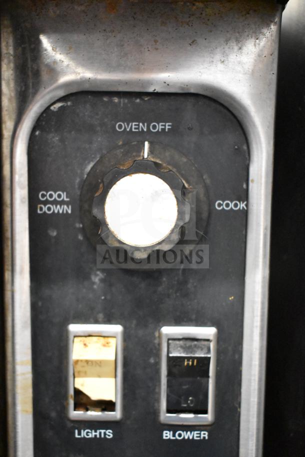 Blodgett DFS-100 convection oven with controls for cool down, cooking, lights, and blower settings.