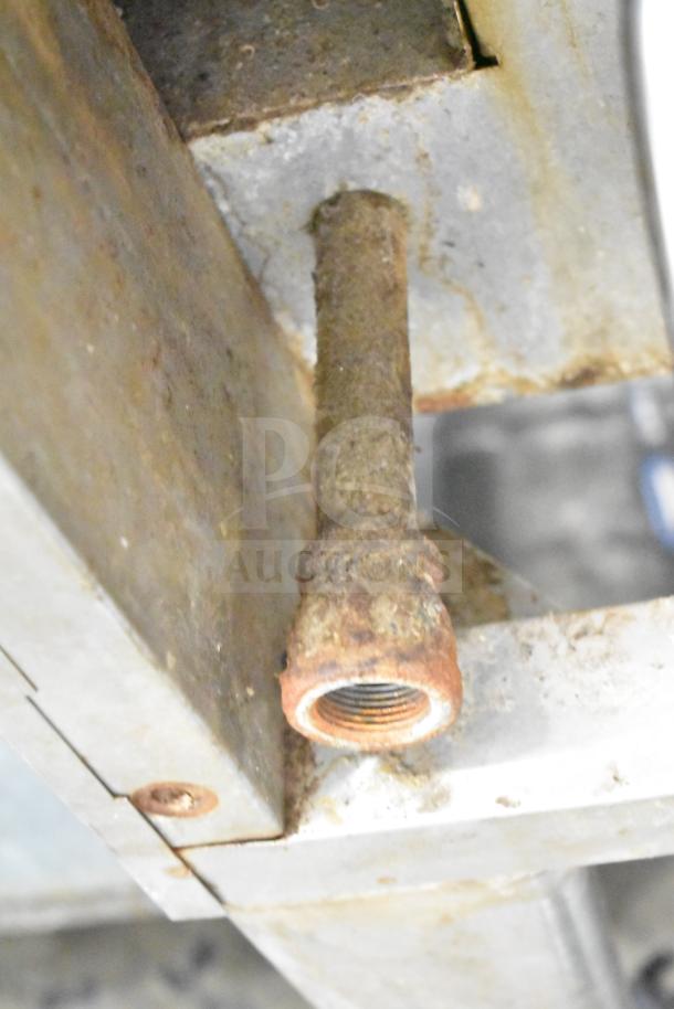 Rusty detail of a Blodgett DFS-100 convection oven's component, showing wear and metal corrosion.