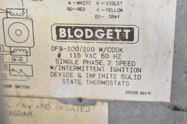 Blodgett DFS-100 convection oven label showing model, 115 VAC, single phase, 2-speed and thermostatic details.