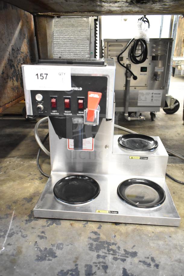 Bloomfield 8572 commercial coffee machine with 3 burners, hot water dispenser. Stainless steel, countertop model, 120 volts.