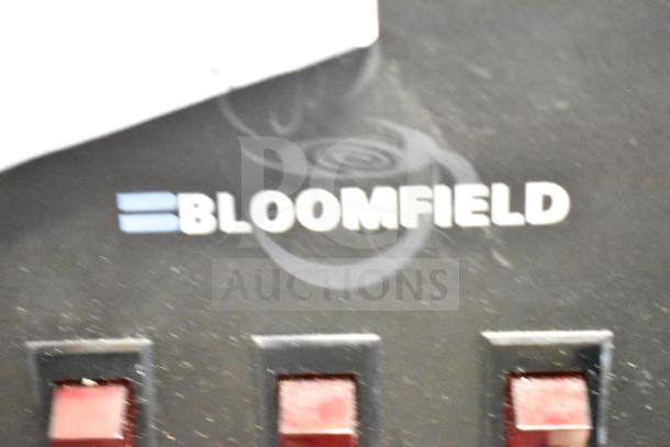 Bloomfield 8572 Commercial Coffee Machine with 3 burners and hot water dispenser. Features visible Bloomfield logo.