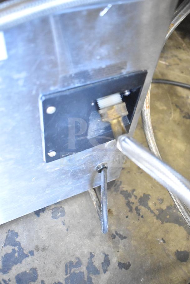 Bloomfield 8572 coffee machine back view, showing 3-burner functionality with hot water dispenser attachment.