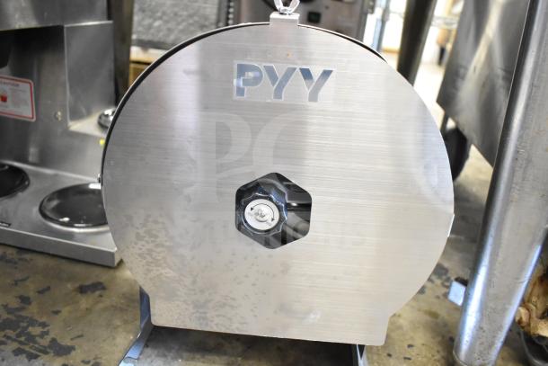 PYY PYYQPJSL061SSUS commercial vegetable/fruit slicer, stainless steel, visible PYY logo, in good condition.