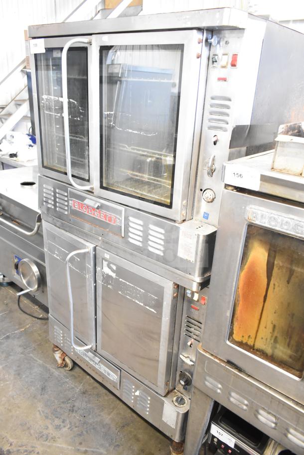 Blodgett commercial gas convection oven, full-size, stainless steel, dual stacked. Used condition with visible wear.