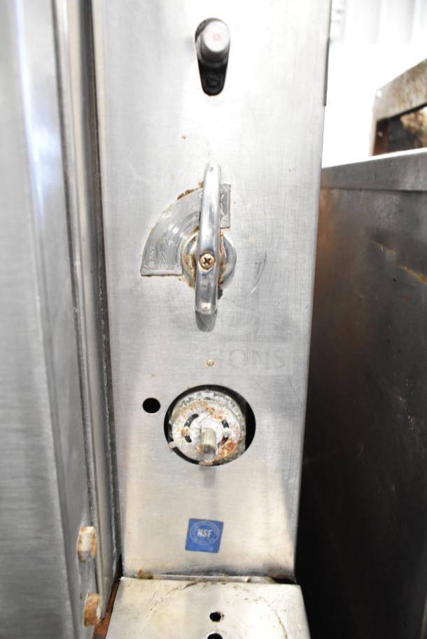 Blodgett commercial gas convection oven control panel, showing wear and NSF certification label.