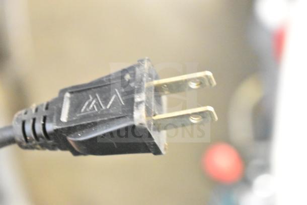 Close-up of the plug for the 2022 CH-IS700 Commercial Countertop Electric Ice Shaving Machine.