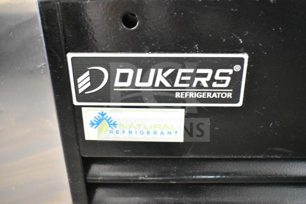 Dukers DSM-68SR commercial cooler label showing brand and natural refrigerant indicator.