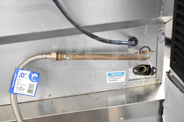 Hoshizaki commercial undercounter ice machine, 115 volts, 1 phase. Features include self-contained design, visible fittings and caution labels.