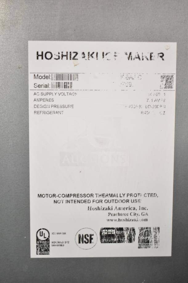 Hoshizaki commercial undercounter ice machine label, displaying model, serial, voltage, and NSF certification.