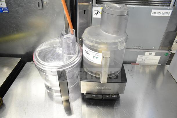 Cuisinart countertop food processor with two bowls, one S blade, 115 volts, 1 phase. Condition: appears used. Model details on base.