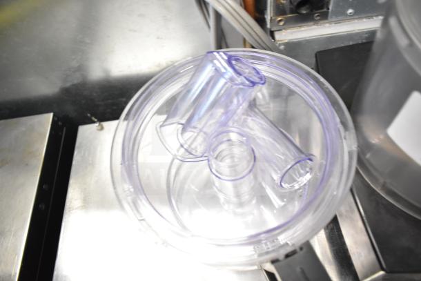 Cuisinart food processor with two bowls and S blade, clear lid shown, 115 volts, used condition.