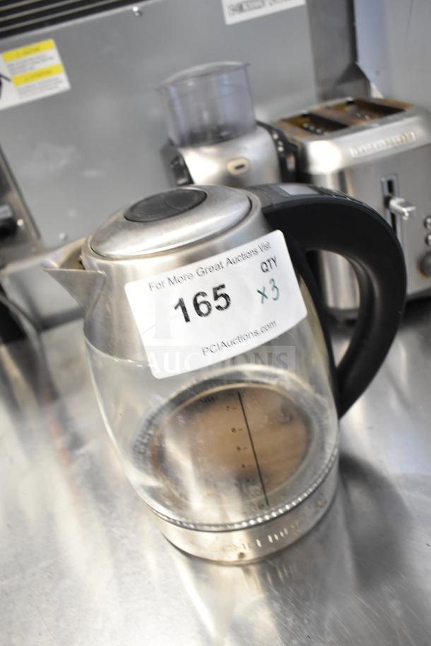 Three kitchen items: Black & Decker 2-slot toaster, Chefman hot water pitcher, Krups GVX212 grinder; auction lot number 165, 3 times your bid.