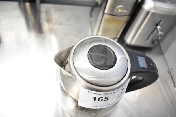 3 appliances: Black & Decker 2-slot toaster, Chefman hot water pitcher, Krups GVX212/6W0 grinder. Auction lot #165.