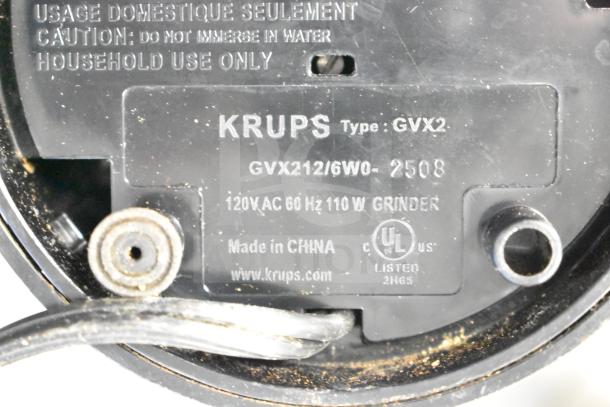 Krups GVX212/6W0 Grinder base with UL certification and caution text, indicating 120V AC, 60Hz, 110W.