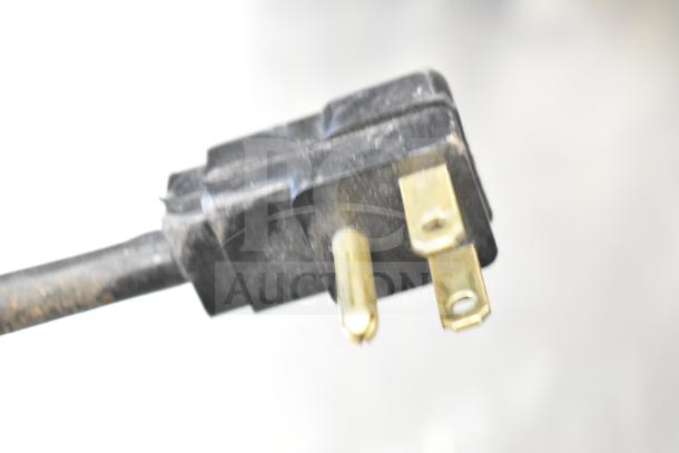 Close-up of power plug for Beverage Air WTR60AHC commercial cooler, 115 volts, 1 phase.