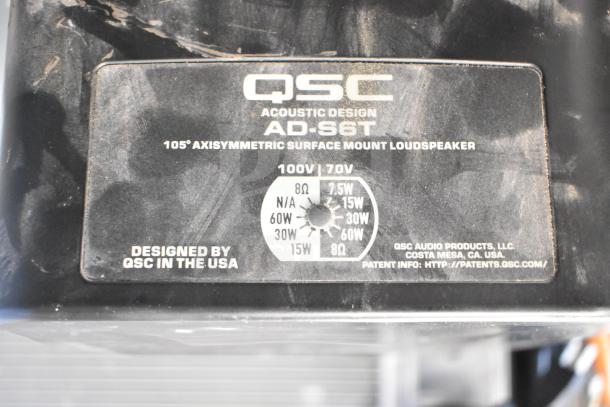 QSC AD-S6T speaker label showing model, power, and design info by QSC in the USA.