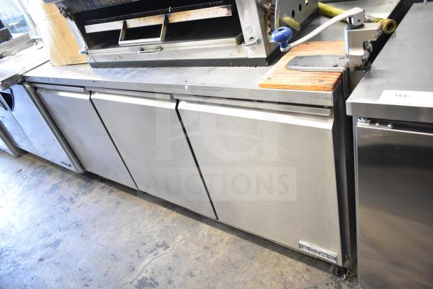 Motak MUF-72 commercial 3 door undercounter freezer, stainless steel, 115 volts, 1 phase, good condition, branded label visible.