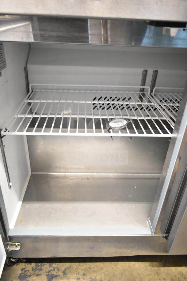 Motak MUF-72 commercial 3-door undercounter freezer, stainless steel, 115 volts, 1 phase, interior shelving, thermometer.