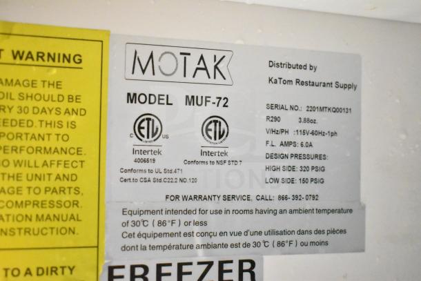 Motak MUF-72 commercial undercounter freezer label showing ETL certifications, voltage, phase, and warranty info.