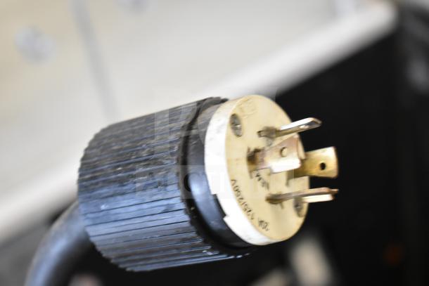 Hoshizaki KM-650MAH ice machine plug, 208-230 volts, commercial use, 1 phase. Power connector close-up.