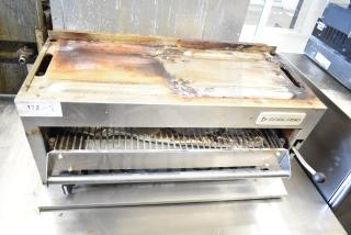 Garland Commercial Gas Powered Cheese Melter, stainless steel, visible wear, branding and controls, auction label 172.