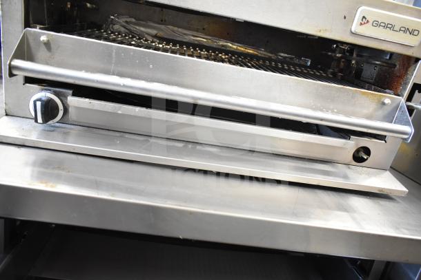 Garland commercial gas cheese melter, stainless steel, manual control knob, Garland logo visible, used condition.