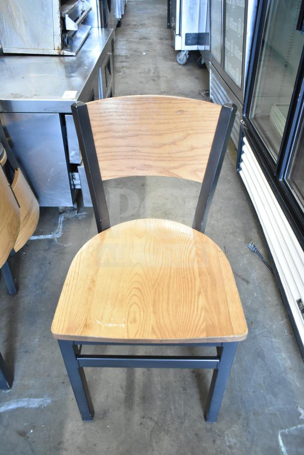 Wood pattern dining chair with metal frame; good condition. Auction lot includes 8 identical chairs.