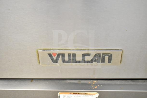 Vulcan 36S-6BN commercial range, 6 burners, oven, overshelf, backsplash, trademark logo visible. Used condition.