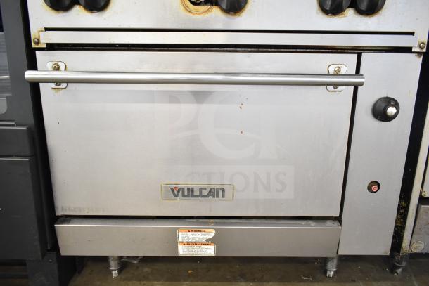 Vulcan 36S-6BN commercial gas range with six burners, oven, overshelf, and backsplash. Used condition with visible wear.