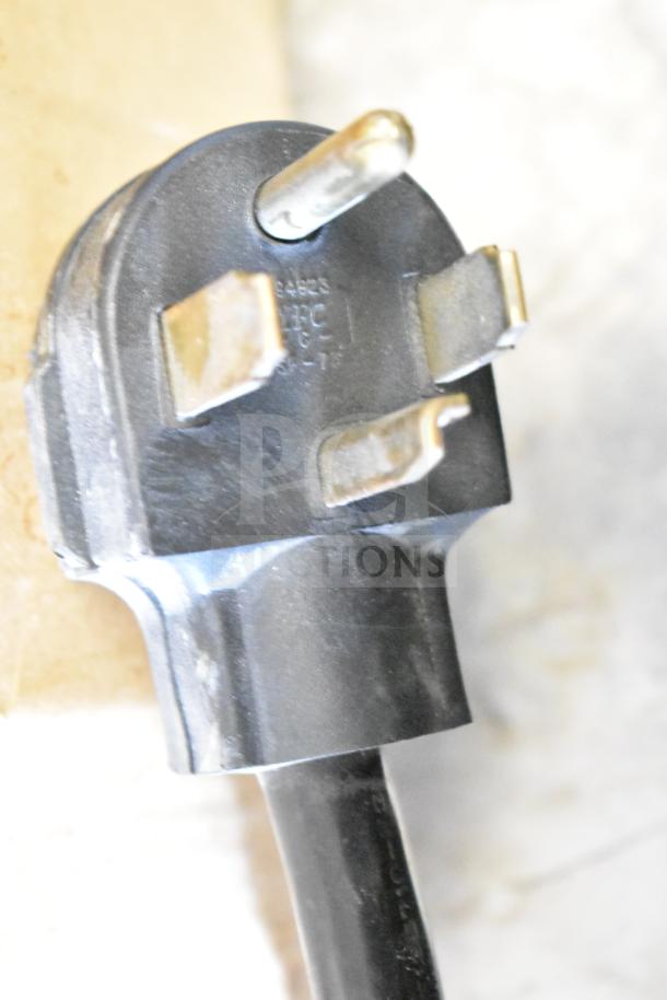 Electrical plug for True GDM-49F 2 Door Reach In Freezer Merchandiser, 115/208-230 Volts, 1 Phase, showing prongs.