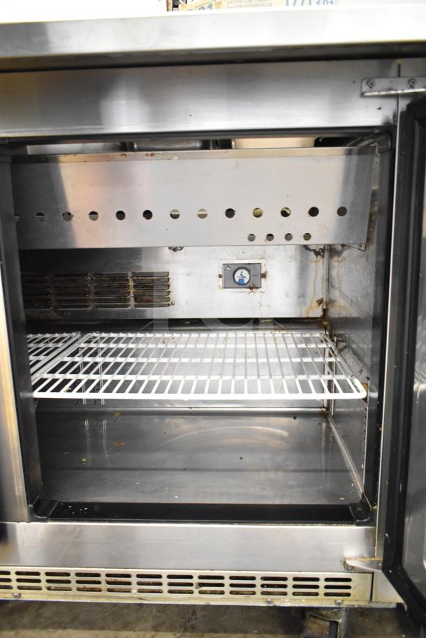 Everest EPBR2 Commercial Sandwich Prep Table, visible interior shelves, stainless steel, 115V, 1 Phase, good condition.