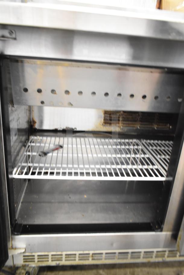 Everest EPBR2 Salad Prep Table, commercial grade, bain marie mega top, 115V, 1 phase, shows wear in interior compartment.